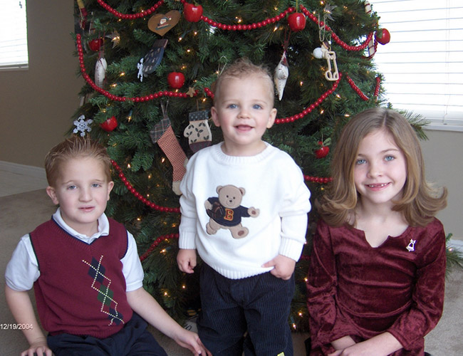 kids around christmas tree