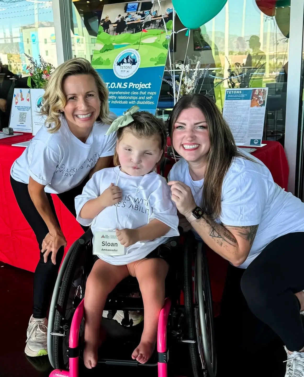 Self-advocate participating in the Utah Parent Center Topgolf event